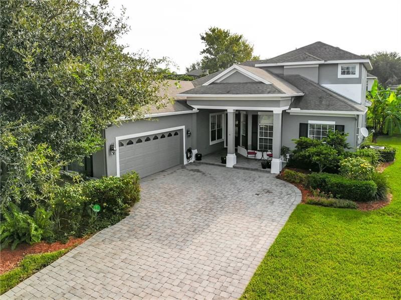 Welcome Home to 1919 Kodsi Court located in the beautiful gated community of Carriage Pointe near all things Winter Garden, Florida!