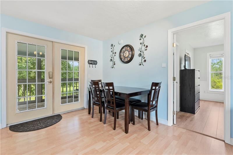 Dining area with French doors to porch
