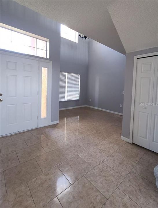 Entry foyer, with formal dining area to the left.