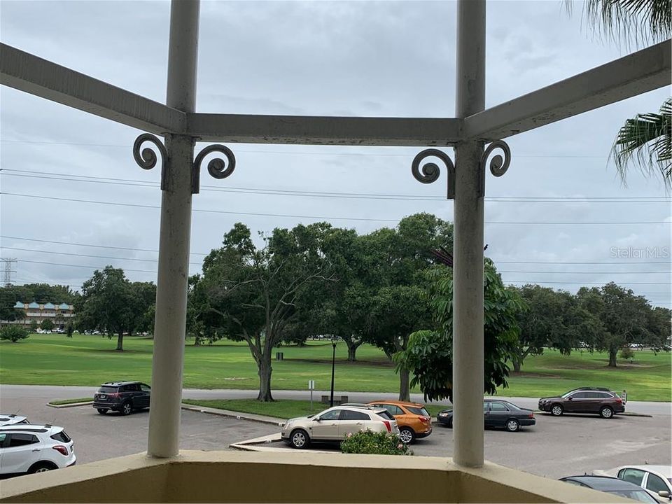 Your building faces the popular golf course.  Residents play for FREE.  This view is from your front balcony.