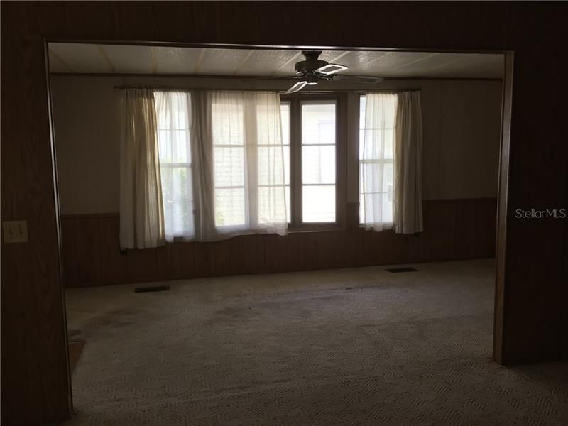 looking from dining room into living room
