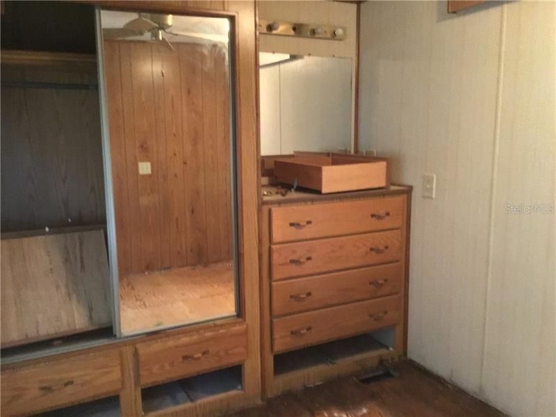 Master bedroom closet and built-in dresser