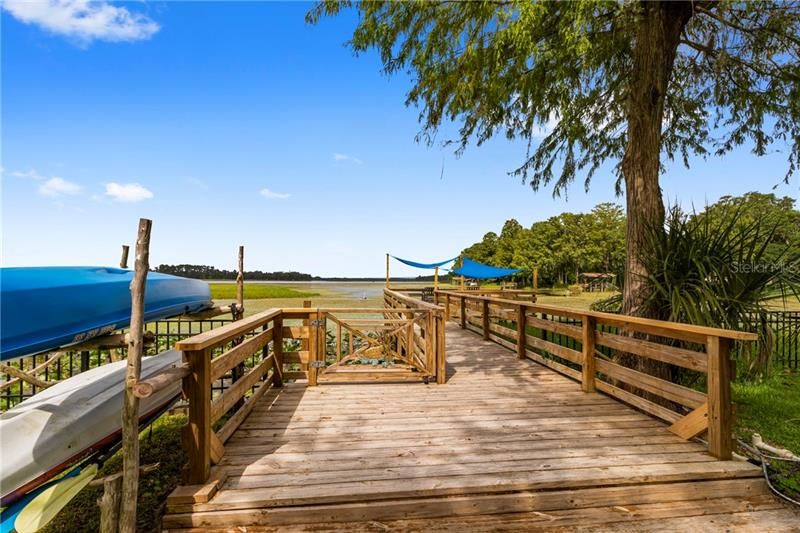 Your private dock, with easy access to get in and out of the water (the gate in the photo has steps leading into the lake)