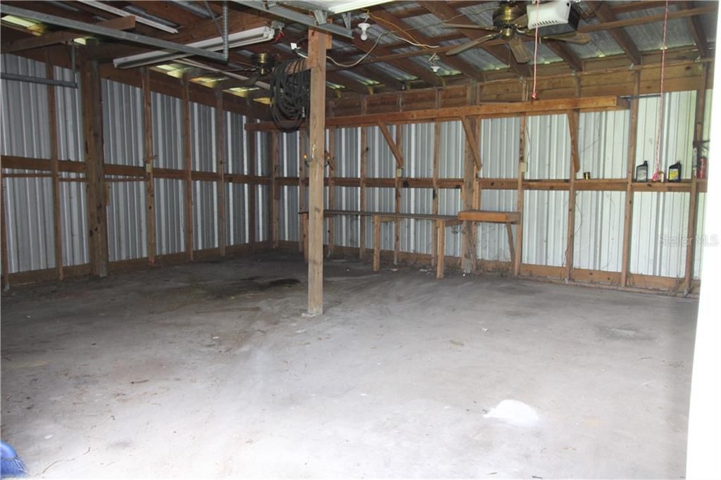 2 car detached garage does include garage door remote, workshop & electricity (not seen here).