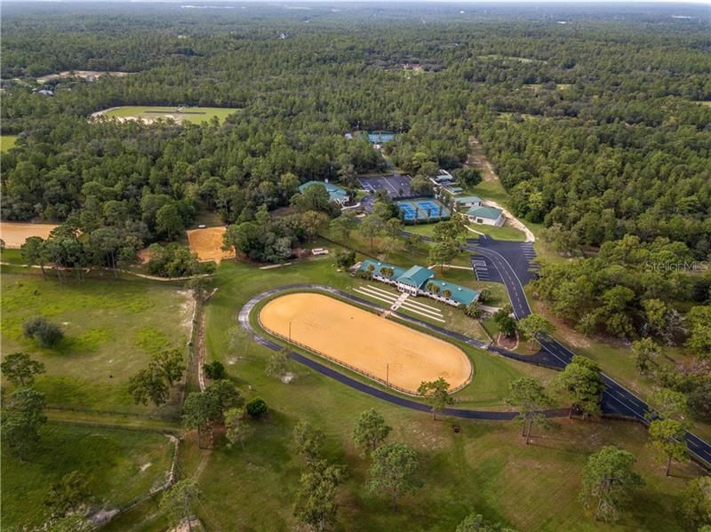 Equestrian Center, Community Center, Playground, Tennis Courts, Stables-drone view