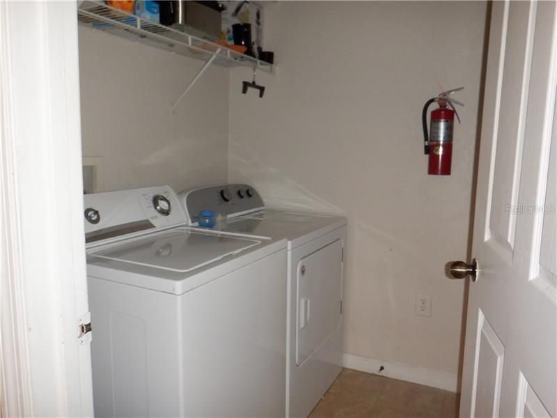 Washer and dryer do not convey. They belong to the tenants. This is to show size of Laundry Room.