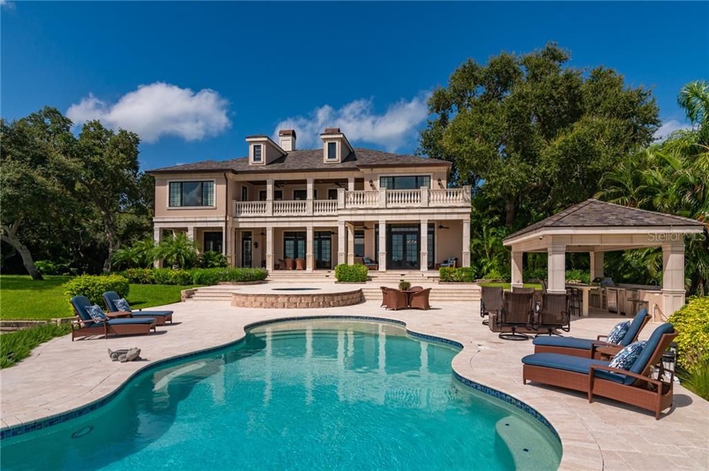 BAYSIDE VIEW OF THIS MAGNICFICENT BAYFRONT POOL HOME