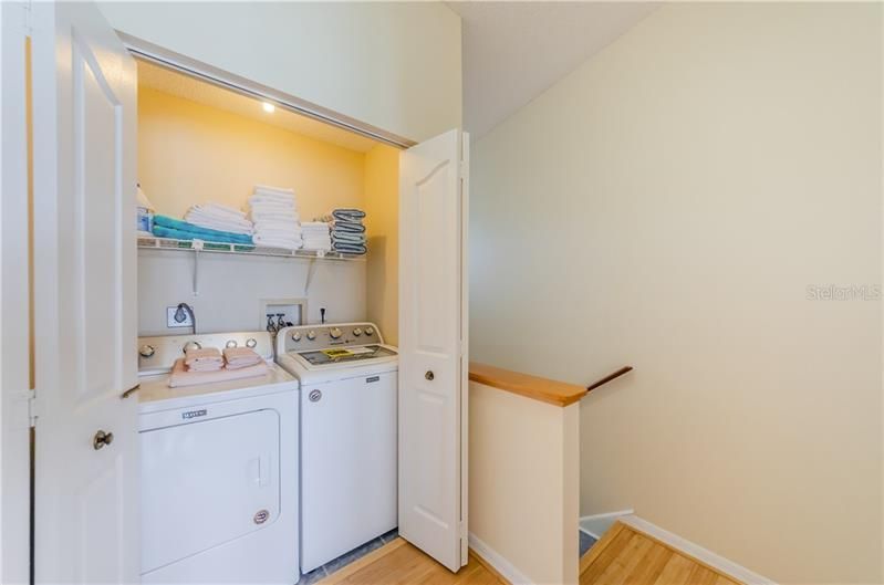 When you come up the stairs to the master suite you have a laundry area before entering the master. Washer and dryer convey.