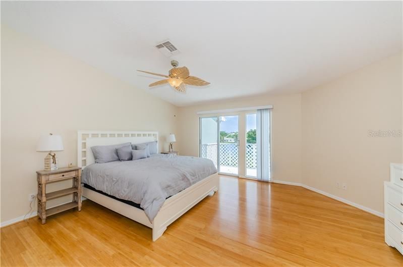 Third level spacious, light and bright master suite with vaulted ceilings and gorgeous water views.  Make this your private escape with en-suite, large walk in closet, your own private balcony and washer and dryer in their own little nook.