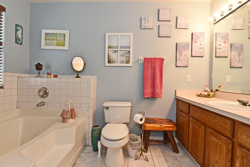 Master bath with beautiful vanity, garden tub & walk-in shower!