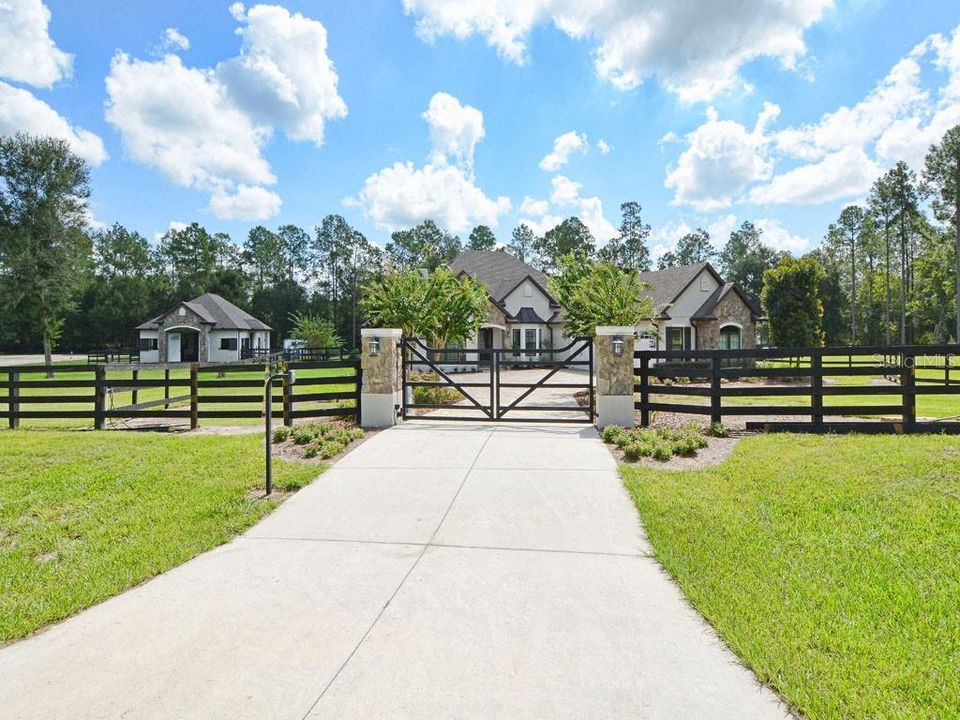 Exquisite Custom Home and 3 Stall Horse Barn on almost 5 acres!