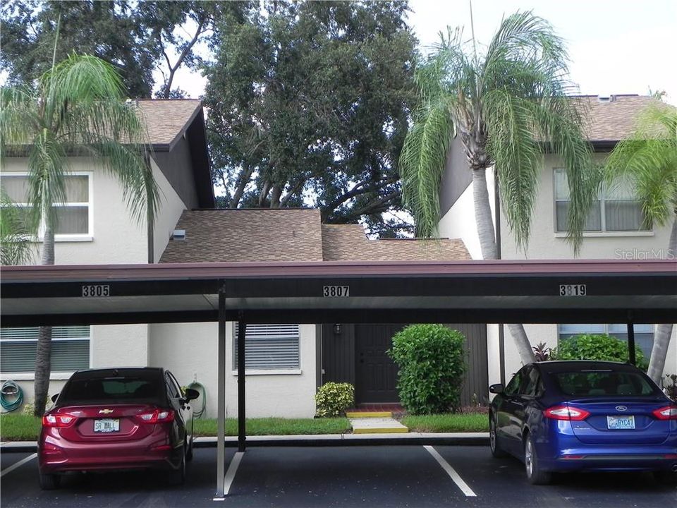 The front view with the assigned carport