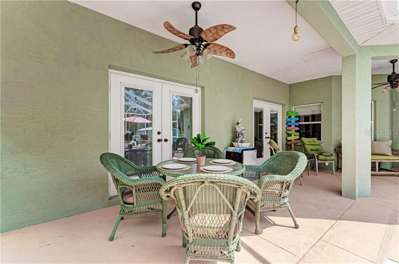 patio view of french doors to the master bedroom and formal living room 27.10'x9.3'