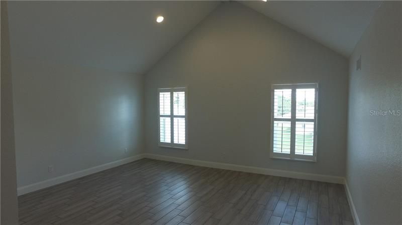 Master bedroom on the 2nd floor provides plenty of space with separate master bath and walk in closet and carpeted storage areas.