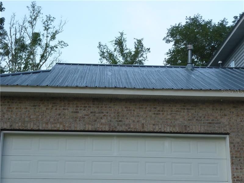 Let's check out the big Garage space next .. close up view of the maintenance free Metal Roof