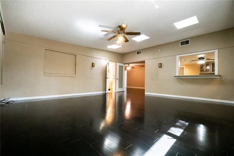 Huge bonus room can be additional family room space with french doors and entry to bathroom 2