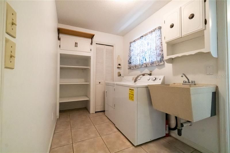 Huge laundry room including washer and dryer