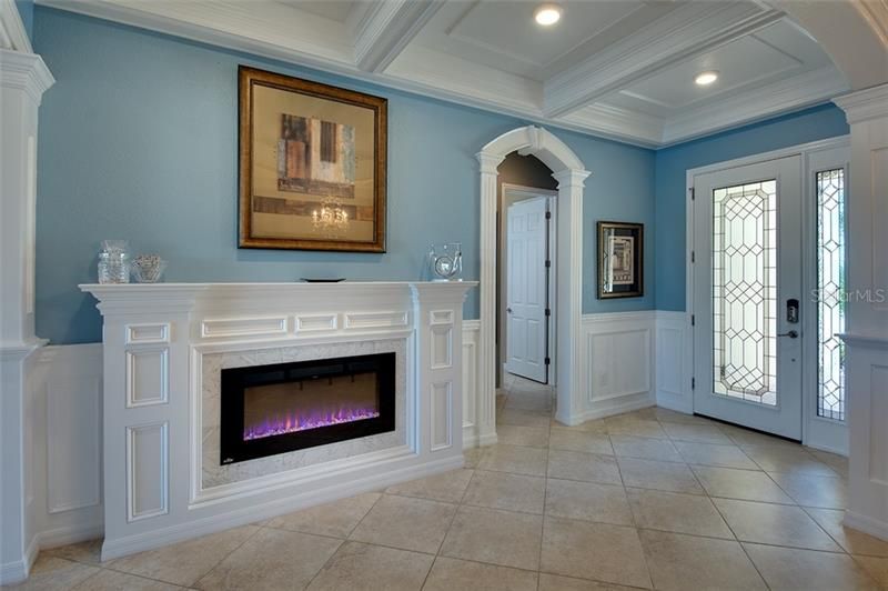Gorgeous Grand Entrance that features the stunning Electric Fireplace
