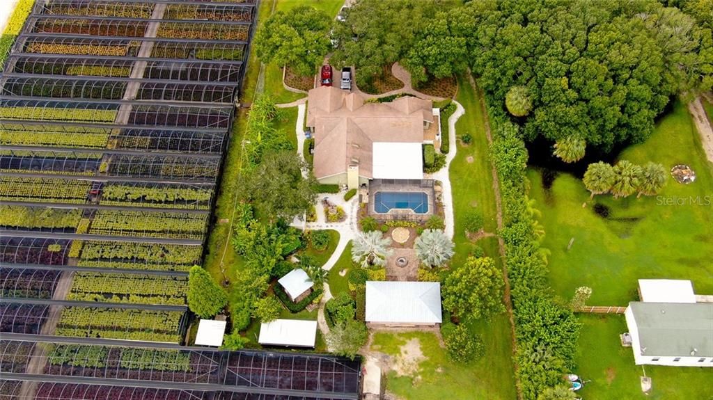 Aerial of 4-BR Home, Nursery, and Property