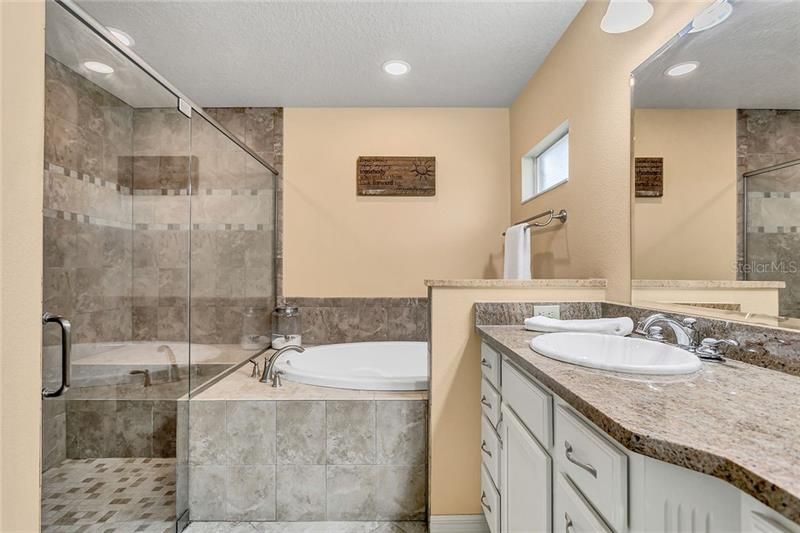 Double Sinks, Soaking Tub and Walk In Shower