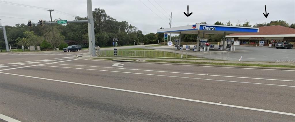 SHOWING THE CORNER OF CLINTON AVE. AND FORT KING RD. PROPERTY SITS BEHIND CHEVRON.