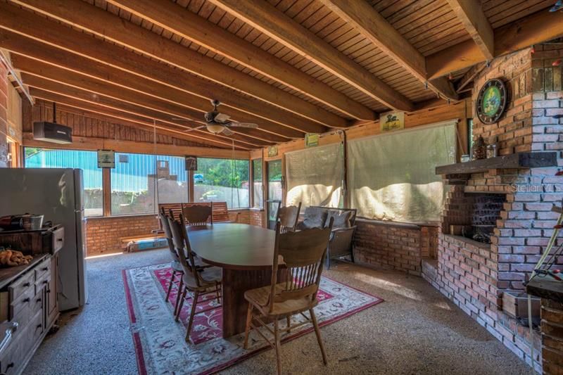 Screened porch with fireplace