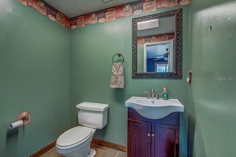 half bathroom off den/office/bonus room