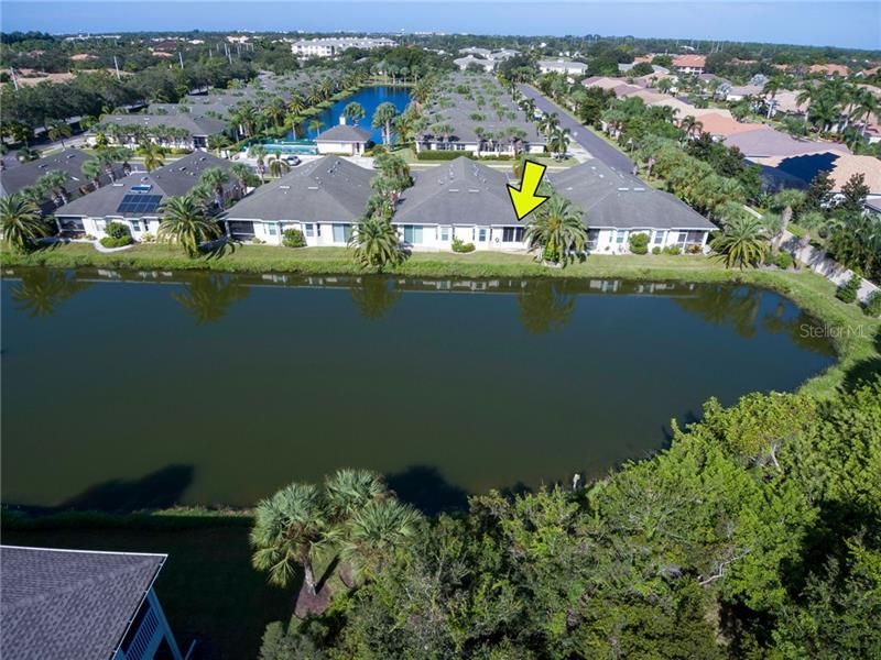Bird's eye of Fountain View and the back of the home with it's peaceful lake view.  Fabulous!
