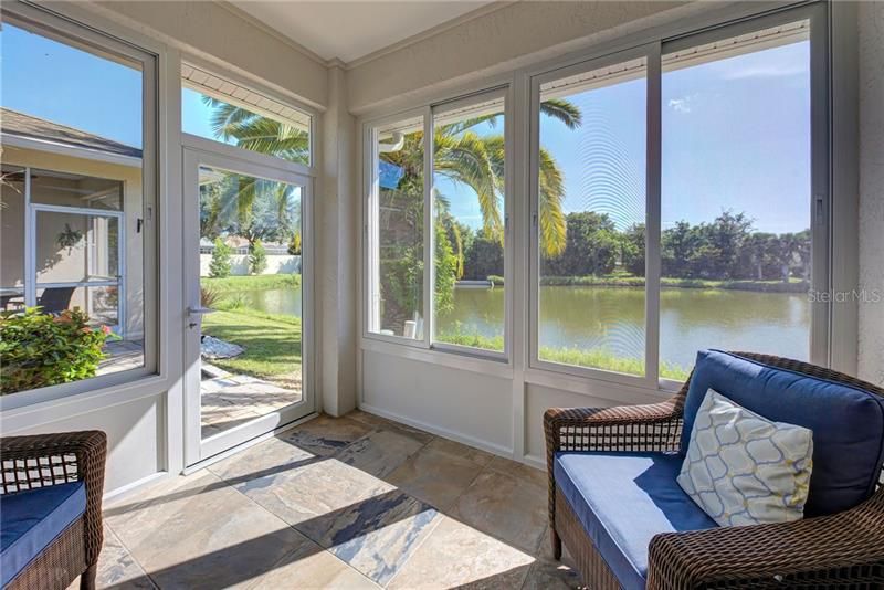 Feel safe with the new accordion hurricane shutters and the windows have screens to bring Florida breezes in.   Ahhh!