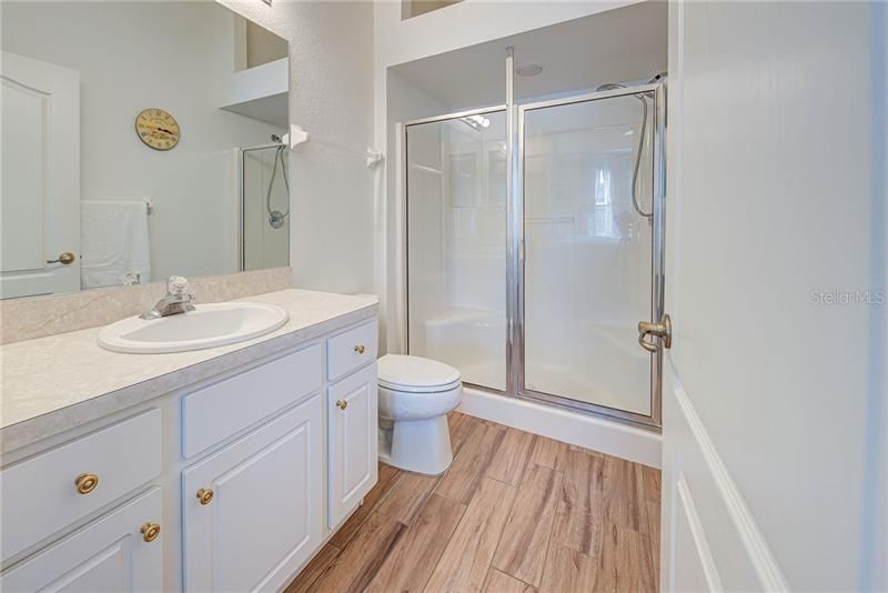 Master bathroom with walk in shower and lots of storage.