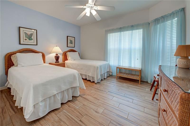 Guests can recharge in their roomy bedroom, far enough away to afford plenty of privacy.