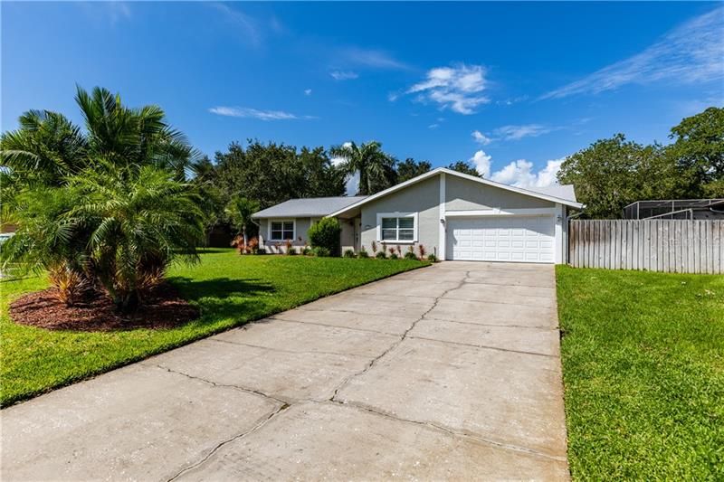 Updated and move in ready. This 4bed/2bath/2 car garage, pool home is situated on over 1/4 acre lot. The lots backs up to a preservation area. Close to everything but feels like you are miles from the hustle and bustle. A short 15 min drive or 30 min bike ride to downtown St Petersburg. Just 25 mins to Tampa International Airport and 30 minutes to downtown Tampa.