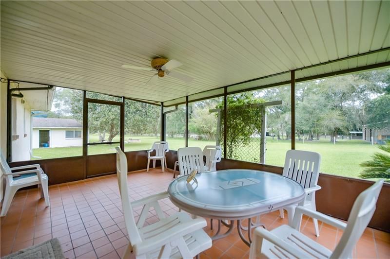 Enjoy a morning cup of coffee on your beautiful screened lanai