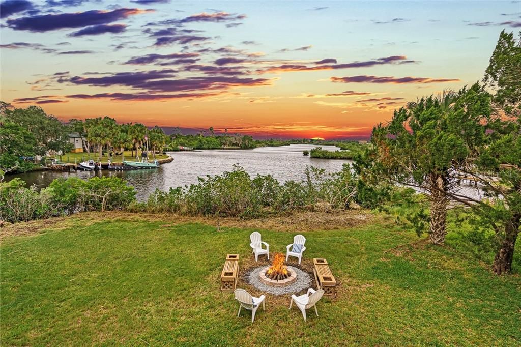 End the evening with smores and a sunset around your private waterfront fire pit. Directly behind this, you will find access to your expansive screened in lanai where you can host cookouts and enjoy the beautiful Florida weather year round.