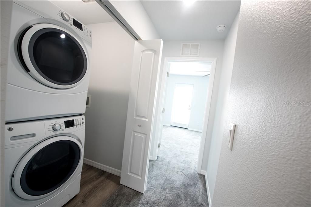 UPGRADED GE STACKABLE WASHER/DRYER INCLUDED! EXTRA SPACE IN UTILITY CLOSET FOR LOTS OF STORAGE.