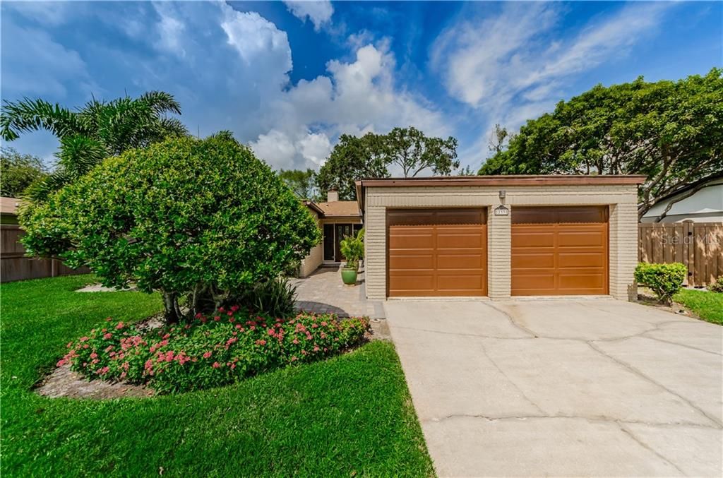 Front of house with 2 car garage