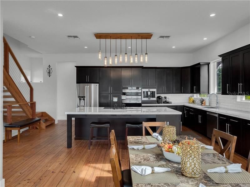 Massive Island is the focal point of this custom kitchen