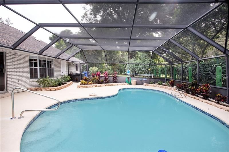 SCREENED IN POOL WITH PLENTY OF DECKING!