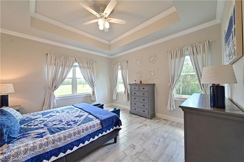 You will have NO problem catching your ZZZ's in this elegant Master Bedroom.