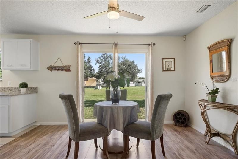 Dinning area with sliders to the backyard