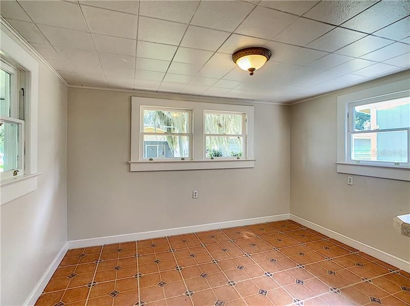 Dining room is 9' x 13' with plenty of windows to provide natural light.