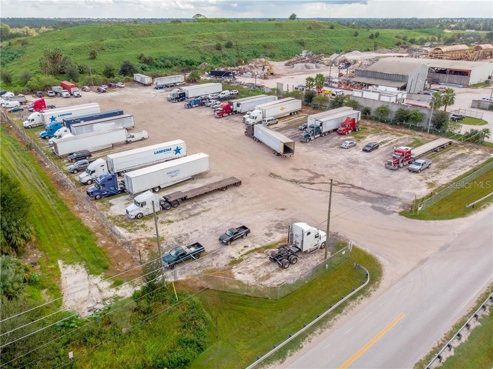 AERIAL VIEW AT THE TRUCK PARKING LOT.