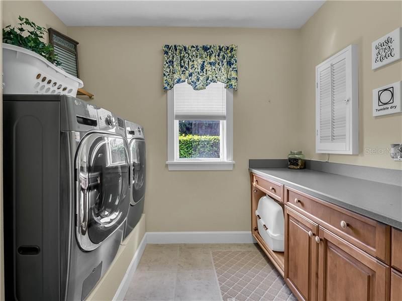 LAUNDRY ROOM WITH WINDOW AND PLENTY OF WORKSPACE