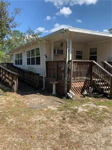 Side porch and ramp to back porch