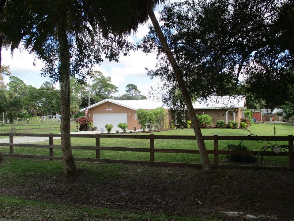 WELCOME HOME!  Beautiful property fully fenced with an electric gate.