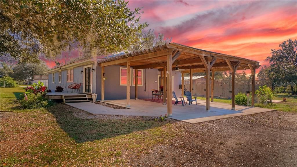 Professional Photo has been enhanced to show what the skies might appear during or after the sunsets at our home... The sun sets on the West side of our property near the creek and the skies are sometimes beautiful like this photo...