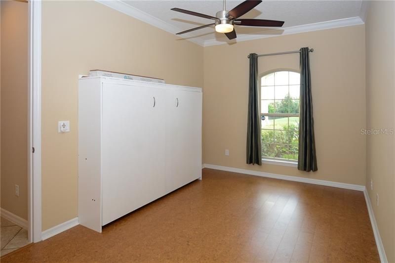 Office/Den with Cork Flooring and a Murphy Bed for your Guest's Convenience