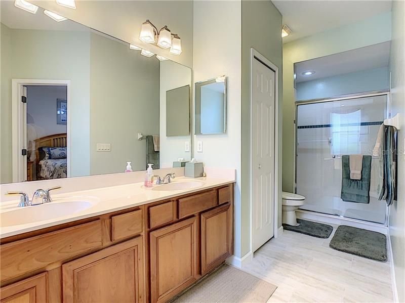 Master bath - dual sinks, linen closet, walk-in shower.