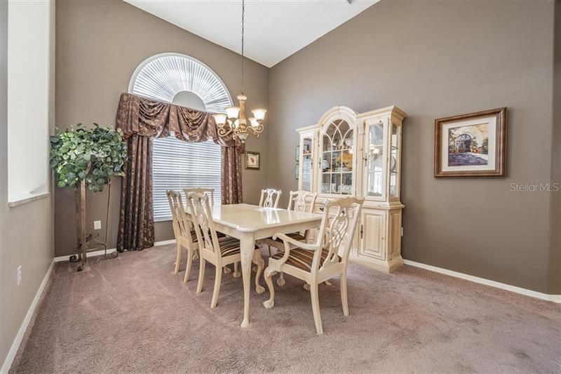 Large dining area with room for china cabinets and buffet