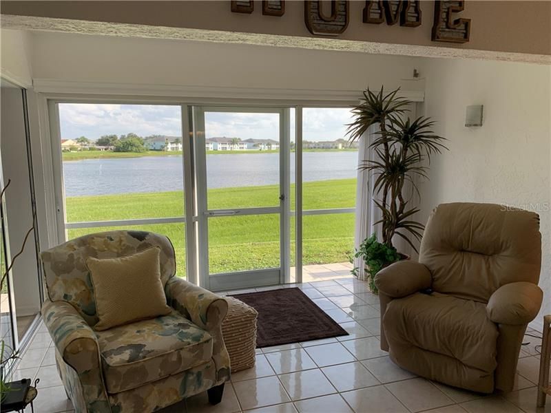 This extended area, with NO step down or interruption to the floorplan, provides extra space now not taken up with a lanai.  You also can more easily capture the view of Lake Rio!